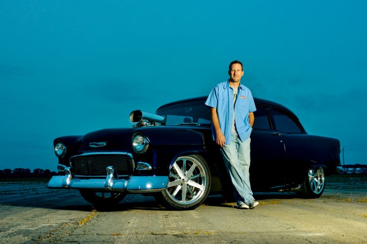 Shawn Brereton leaning on his 55 Chevy